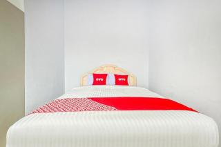 OYO 1906 Zhafira Guest House Syariah - Makassar - 1