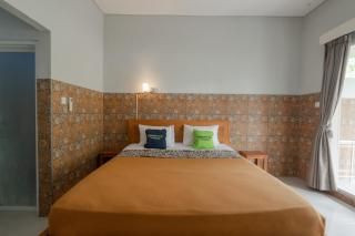Urbanview Asung 2 Guesthouse Tibubeneng - Dalung - 9