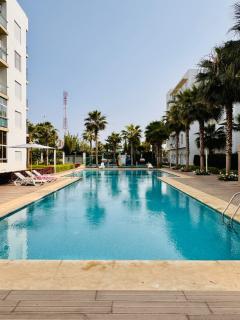 Bright Apt with Balcony, WiFi, Parking and Pool Resort - Bouznika - 0