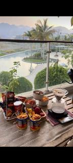 In jebel sifah resort Luxury 1bhk pool view apartment - Mascate - 2