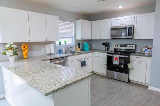Elegant Haven Stylish Interiors with Serene Deck Views and Modern Comforts - 2