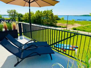 8 Personen Ferienhaus ,,Seegelblick" am Goitzschesee, erste Reihe am Strand mit Sauna, Kamin, Wallbox & SUP - Pouch - 0
