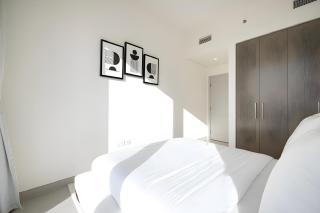 Luxe 2BR Apt near Burj Khalifa with pool view and a lively downtown boulevard walk - 3