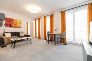 ALURE RESIDENCES 12 & 24h self check-in & private parking next to the apartment building included, CITY CENTER right on SNP Square in a quiet passage, new building, best deal in town - Banská Bystrica - 0