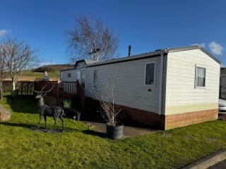 12 Field Views - 2 Bedrooms 2 bathrooms - 1 shower - 1 bath No sign written vans - 0
