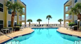 Poolside Villas 104 near beach sleeps 5 - 7