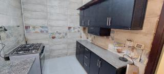 Fully finished 3-bedroom, 3-bathroom apartment with garden view in Jana Compound, Sheikh Zayed near Hyperone - Sheikh Zayed - 2