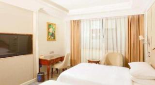 Vienna Hotel Guangzhou Baiyun College Jinyuan Plaza - Canton - 1