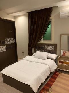 A modern serviced apartment with private garden in Sheikh Z - Sheikh Zayed - 2