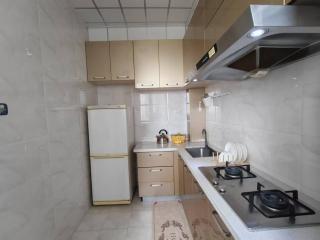 Central Street River View Apartment - Harbin - 9