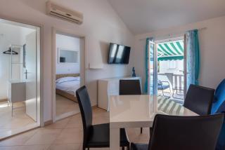 APARTMENTS BRUNO 3 - two-room penthouse apartment - wonderful view of the sea - the best location, first row to the beach - 10 minutes from Supetar ferry port - free secured parking - facilities nearby - Sutivan - 8