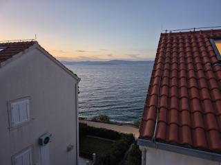 APARTMENTS BRUNO 3 - two-room penthouse apartment - wonderful view of the sea - the best location, first row to the beach - 10 minutes from Supetar ferry port - free secured parking - facilities nearby - Sutivan - 9
