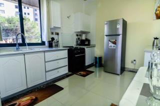 newly furnished three bedroom apartment with heated swimming pool fully equipped gym children playground ample parking space and unbeatable scenic city views - Nairobi - 4