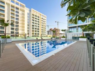 Elegant 1-Bed with Pool, Gym, Parking and Balcony - 2