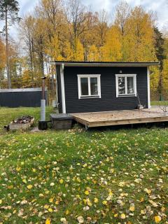 A simple stuga on a lake incinerating toilet in a separate building next to the cabin Water for drinking and washing hands dishes comes from two containers that attach to a faucet through a simple electric pump OBS no shower on site - Grythyttan - 7
