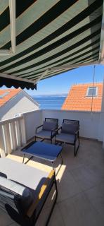 APARTMENTS BRUNO 3 - two-room penthouse apartment - wonderful view of the sea - the best location, first row to the beach - 10 minutes from Supetar ferry port - free secured parking - facilities nearby - Sutivan - 0