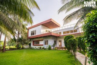 StayVista at Azure Bliss with Huge Pool, BBQ, Wi-Fi - Nagaon - 2