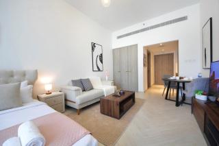 Contemporary JVC Studio with Rooftop Pool Gym - 1