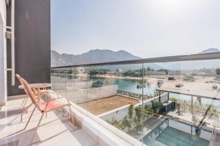 Facing the Sea and Mountains 4BR Villa with Assistant Room and Private Pool, Al Dana Island, Fujairah by Deluxe Holiday Homes - 1