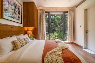 SaffronStays Ibiza - 4BR Nerul villa, glass-bottom pool into living, ensuite rooms, rooftop party zone near Candolim - 9