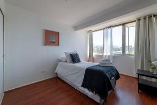Embark on a journey of exclusivity in our 2BR home - Santiago - 4