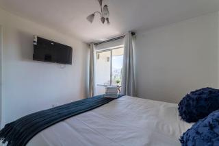 Embark on a journey of exclusivity in our 2BR home - Santiago - 2