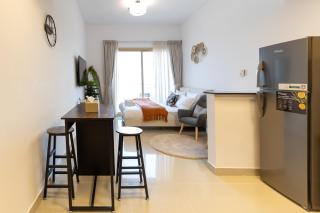 Serene studio apartment with Burj Khalifa view in Jumairah Village Circle JVC - 5