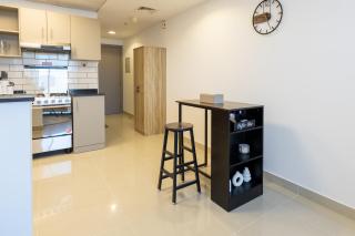 Serene studio apartment with Burj Khalifa view in Jumairah Village Circle JVC - 7