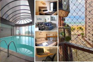 2 Quartos com Varanda sendo 1 Suíte, Cozinha completa, Vista Mar - Condomínio Frente Mar, Lazer completo com Piscina coberta e aquecida, Estacionamento, Portaria 24h - Apto indicado para Grupos, Famílias e Hóspedes a Trabalho, Praia da Guilhermina - Praia Grande - 0