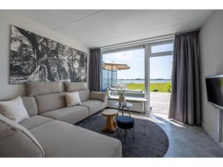 Holiday Home by Veerse Meer with Panoramic View, cleaning included - Kamperland - 6