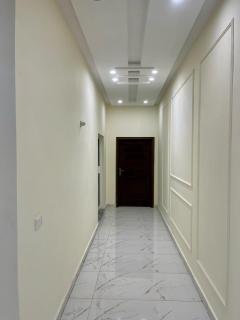 Elysian Nest 2BR Apartment Abdullah Gardens - Faisalabad - 9