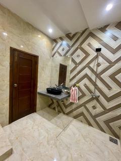 Elysian Nest 2BR Apartment Abdullah Gardens - Faisalabad - 1