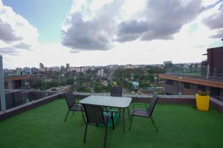 spacious two bedroom apartment with heated swimming pool fully equipped gym ample parking space and a relaxing rooftop with breathtaking views - Nairobi - 6