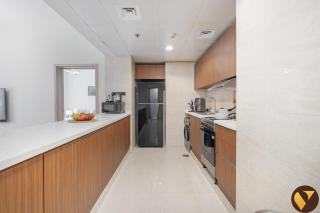 Vogue Spacious Two Bedroom in Pulse Smart Residence JVC with Balcony and access to rooftop swimming pool - 2