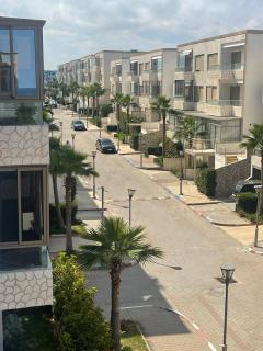 Sunny modern Apartment- Ocean & Pool view in Al Mansouria - Mansouria - 8