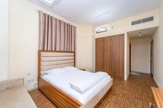 Luxury 2 bedroom next to beach with swimming pool gym and kids play area - Ajman - 1