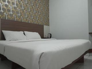 Smart Inn at Aeropolis Residence - Teko - 7