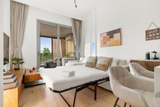 Bright 2BR Retreat Balcony & Pool Near Jumeirah Village Circle - 4