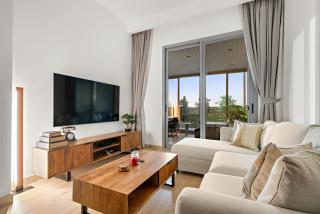 Bright 2BR Retreat Balcony & Pool Near Jumeirah Village Circle - 9