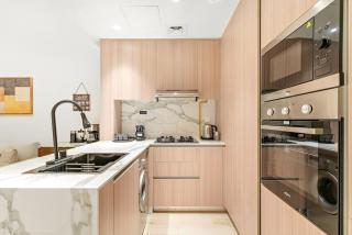 Bright 2BR Retreat Balcony & Pool Near Jumeirah Village Circle - 7