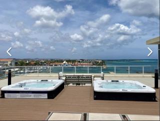 stunnig ocean view 2 BEDROOM, 2 bath with infinity pool - Oranjestad - 6