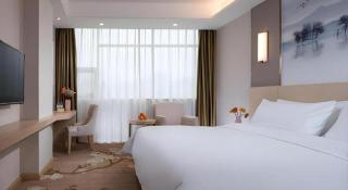 Vienna Hotel Hunan Huaihua Xupu Wanda Plaza - Xupu - 1