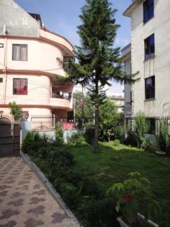 One room with two single beds with natural views - - 2