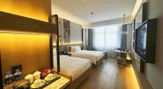 Zhangjiagang Jiangnan Garden Hotel - Xiwujieqiao - 4