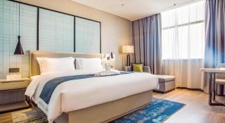 Echarm Hotel Qionghai Wanquan River - Qionghai - 9