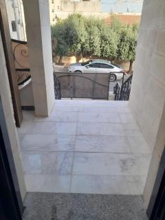 شقة فاخرة 2غرف نوم حديثة البناء في الرابية طابق أرضي مع ترس خارجي - Amman - 8