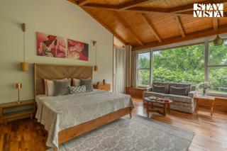 StayVista at Mayflower Aramgarh in middle of Orchards with Lawn, Bonfire, BBQ - 1