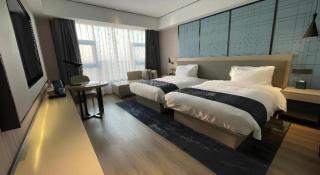 Echarm Hotel Changjiang Shilu - Baomei - 3