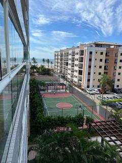 Home 12| Ap piscina aquecida pé na areia Bertioga - Bertioga - 1