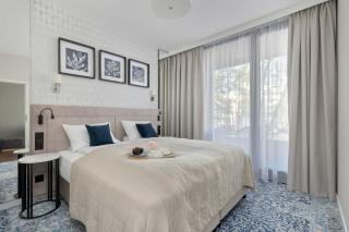 Klimatyzowany Apartament w Mielnie z Parkingiem Blisko Plaży i Jeziora by Noclegi Renters - Mielno - 9